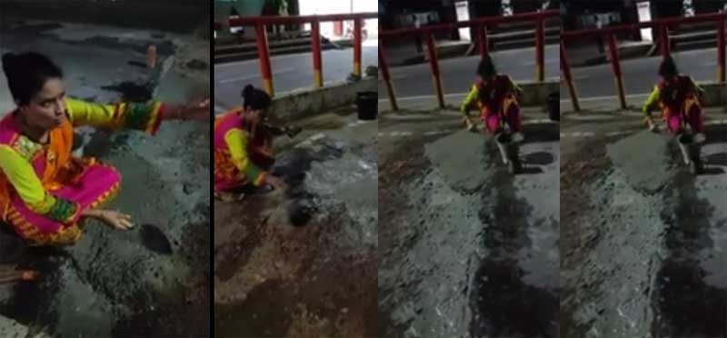 মধ্যরাতে নগরের ভাঙা সড়ক সংস্কারে নেমে পড়লেন এই নারী